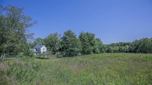 3340 Stonehouse Rd, De Soto, MO 63020 - view of yard with a forest view and fence