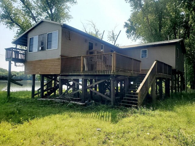 801 S Front St, La Grange, MO 63448 - back of house featuring stairway and a deck with water view