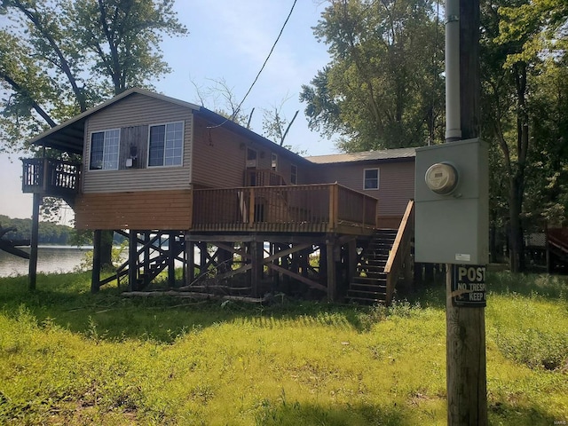 801 S Front St, La Grange, MO 63448 - back of house with stairway and a deck