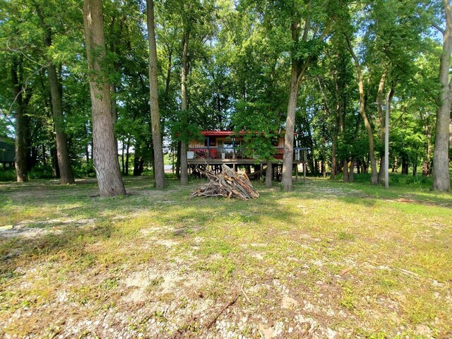 801 S Front St, La Grange, MO 63448 - view of green lawn featuring a wooden deck