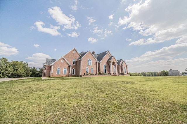 6708 Brown Ln, Poplar Bluff, MO 63901 - view of front of home with brick siding and a front yard