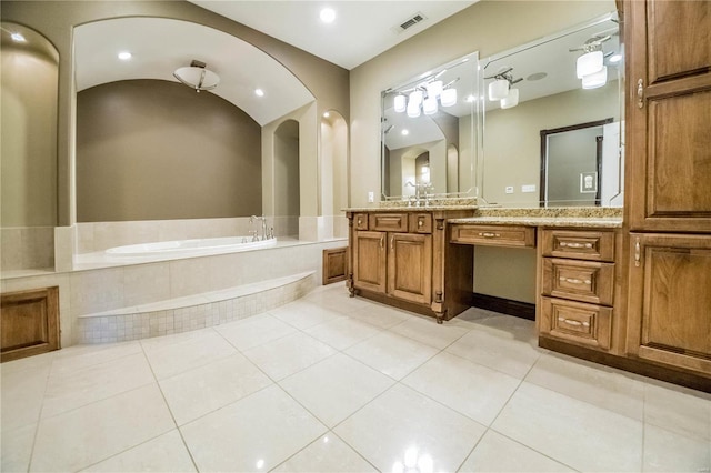 6708 Brown Ln, Poplar Bluff, MO 63901 - bathroom featuring tile patterned floors, a garden tub, and vanity