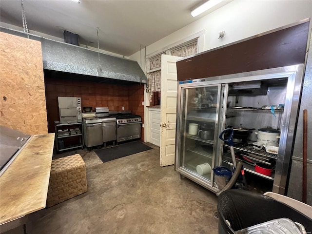 207 S Main St, Hannibal, MO 63401 - kitchen featuring unfinished concrete floors and stainless steel appliances