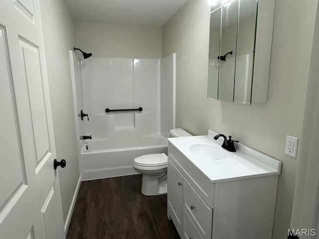 902 C St, Malden, MO 63863 - full bathroom with wood finished floors, vanity, toilet, and  shower combination