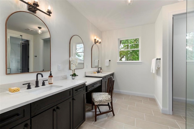 330 Emmerson Ave, Kirkwood, MO 63122 - bathroom with vanity, tile patterned floors, and baseboards