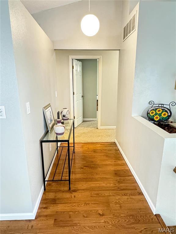 21 Forest Ln, Union, MO 63084 - hallway featuring wood finished floors and baseboards