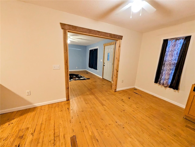 1035 Park Ave, Poplar Bluff, MO 63901 - spare room featuring ceiling fan, baseboards, and light wood finished floors