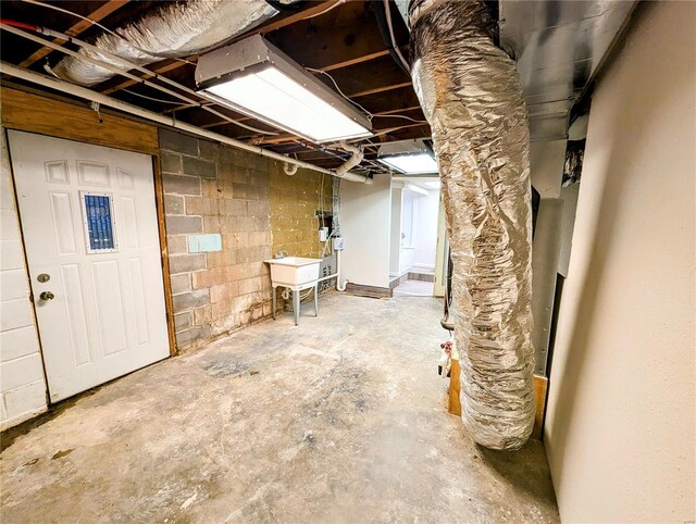 1035 Park Ave, Poplar Bluff, MO 63901 - unfinished basement featuring concrete block wall and a sink