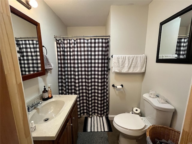 810 E Cleveland St A/B, Unit A/B Monroe City, MO 63456 - bathroom with toilet, vanity, and a shower with curtain