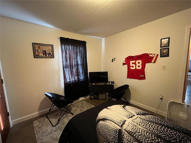 810 E Cleveland St A/B, Unit A/B Monroe City, MO 63456 - bedroom with baseboards and a textured ceiling