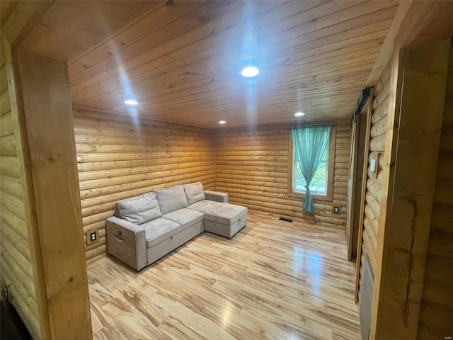 2268 Madison 244, Fredericktown, MO 63645 - unfurnished living room with log walls, light wood finished floors, wood ceiling, and recessed lighting