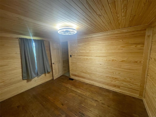 2268 Madison 244, Fredericktown, MO 63645 - additional living space featuring wood ceiling, wooden walls, and dark wood-style floors