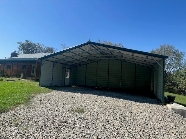 2268 Madison 244, Fredericktown, MO 63645 - view of parking / parking lot with gravel driveway and a detached carport