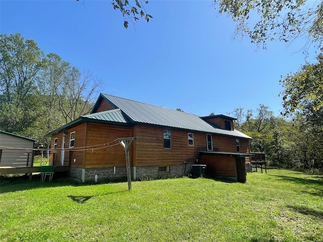 2268 Madison 244, Fredericktown, MO 63645 - view of side of home with a lawn, a deck, metal roof, and central AC unit