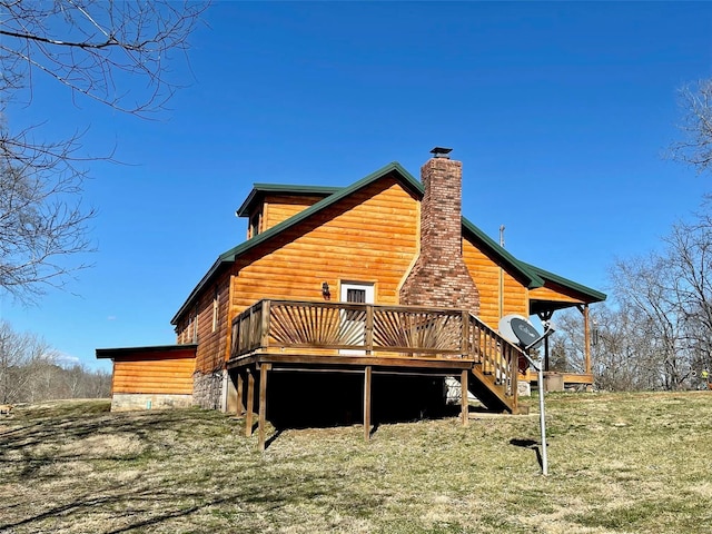 2268 Madison 244, Fredericktown, MO 63645 - back of house featuring log veneer siding, a deck, a chimney, and stairway