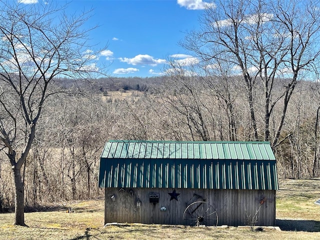 2268 Madison 244, Fredericktown, MO 63645 - view of outdoor structure with an outbuilding and a forest view