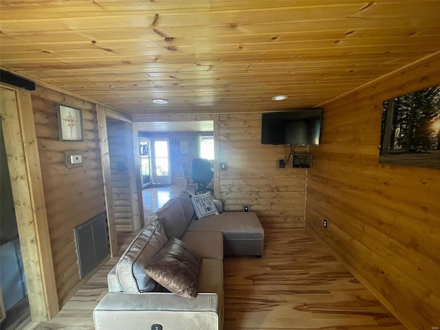 2268 Madison 244, Fredericktown, MO 63645 - living room with wood ceiling, light wood finished floors, and wooden walls