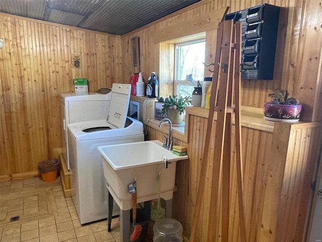 2268 Madison 244, Fredericktown, MO 63645 - laundry area featuring wooden walls and washing machine and clothes dryer