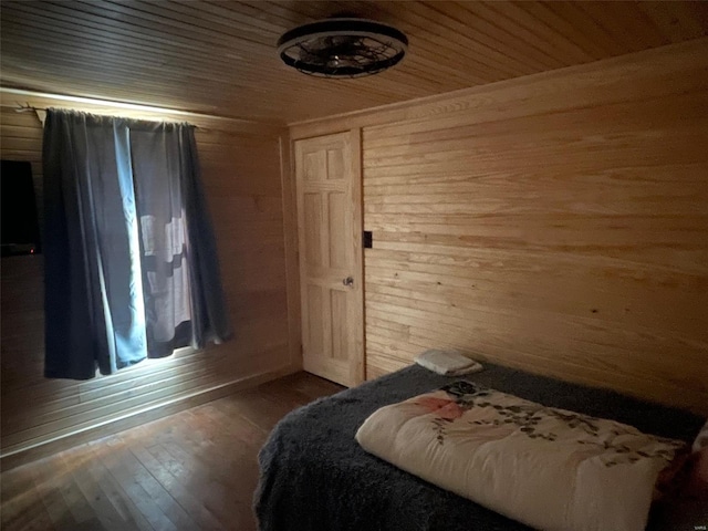 2268 Madison 244, Fredericktown, MO 63645 - bedroom with wooden walls, wood finished floors, and wood ceiling
