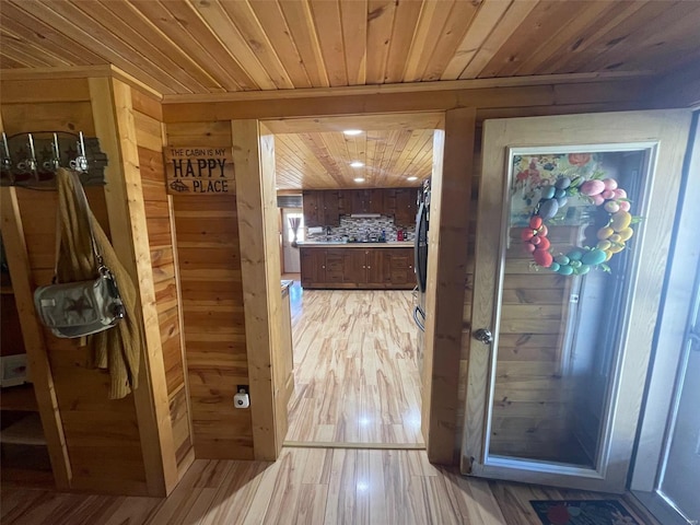 2268 Madison 244, Fredericktown, MO 63645 - hall featuring wood ceiling, wooden walls, and light wood-style floors