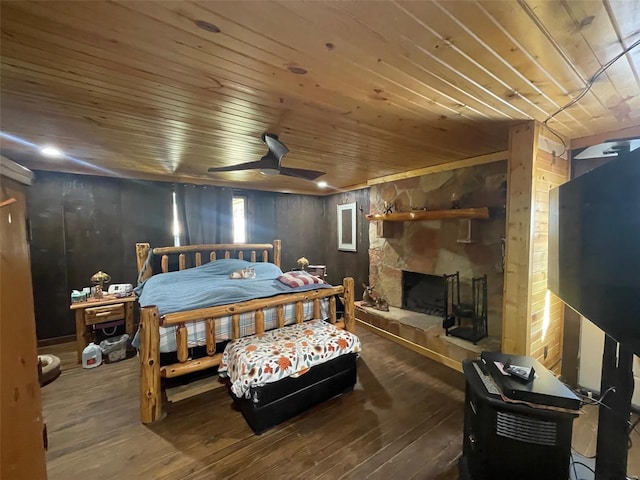 2268 Madison 244, Fredericktown, MO 63645 - bedroom with wooden ceiling, hardwood / wood-style floors, wood walls, and a stone fireplace