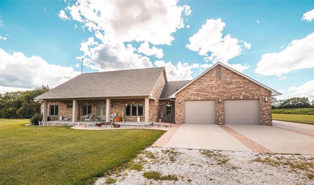 272 NE 1350th Ave, Greenfield, IL 62044 - view of front of house featuring an attached garage, concrete driveway, a front yard, brick siding, and roof with shingles