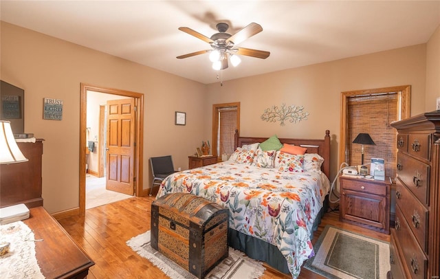 272 NE 1350th Ave, Greenfield, IL 62044 - bedroom featuring light wood-style flooring, a ceiling fan, and baseboards