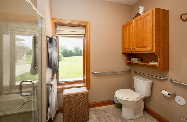272 NE 1350th Ave, Greenfield, IL 62044 - bathroom with a shower stall, toilet, and baseboards