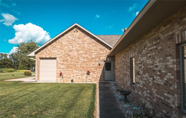272 NE 1350th Ave, Greenfield, IL 62044 - view of property exterior featuring brick siding, a lawn, and a garage