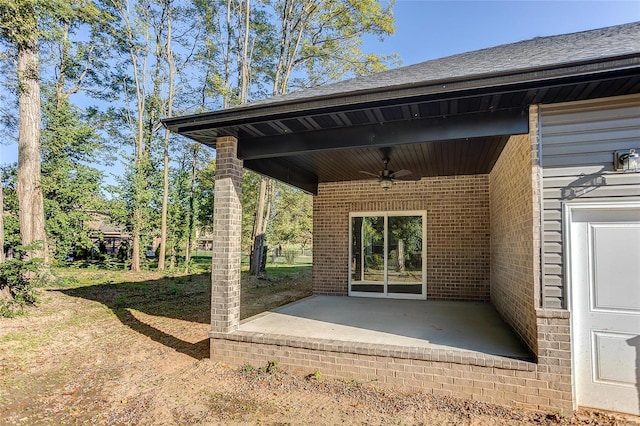 view of patio featuring ceiling fan