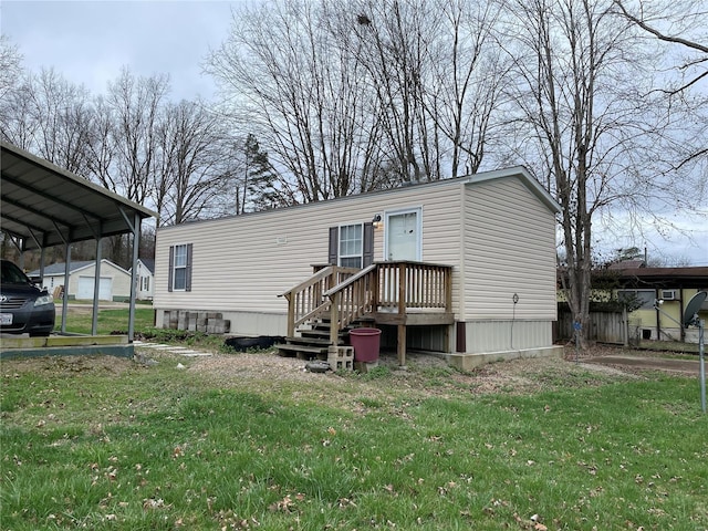 718 E Daniels St, Piedmont, MO 63957 - back of property featuring a lawn