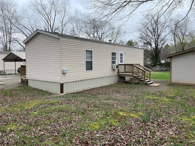 718 E Daniels St, Piedmont, MO 63957 - view of home's exterior with a carport