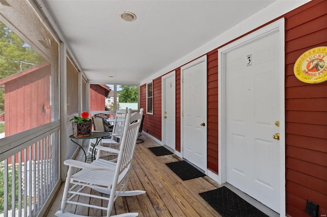 15 Mill St, Elsah, IL 62028 - wooden deck featuring covered porch