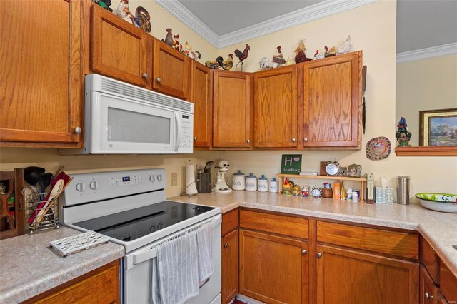 15 Mill St, Elsah, IL 62028 - kitchen with white appliances, ornamental molding, light countertops, and brown cabinetry