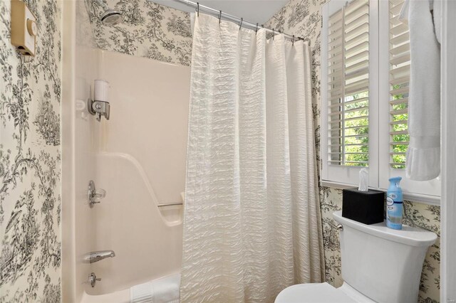 15 Mill St, Elsah, IL 62028 - full bath with wallpapered walls, toilet, and shower / bath combination with curtain
