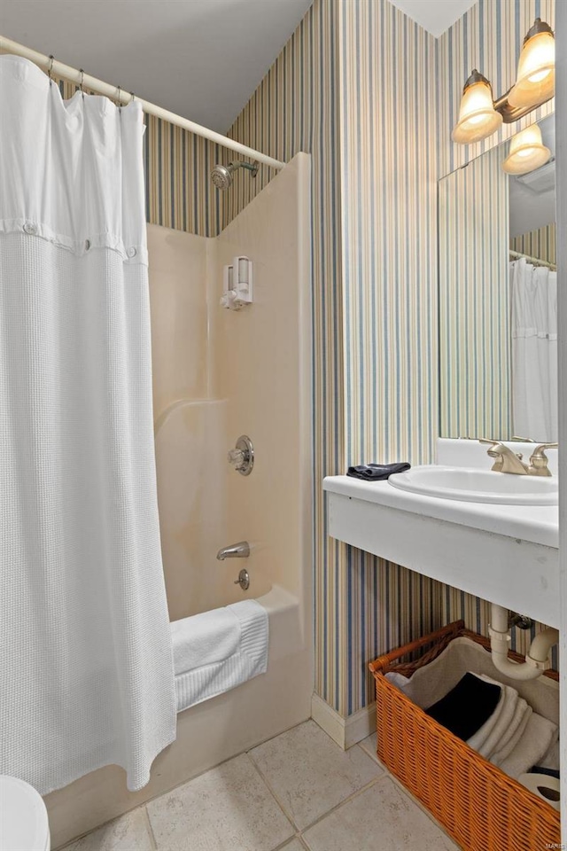 15 Mill St, Elsah, IL 62028 - full bath with wallpapered walls, shower / bath combination with curtain, tile patterned floors, toilet, and baseboards