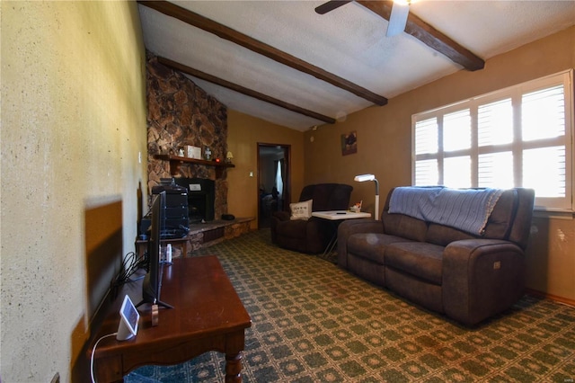 carpeted living room with a fireplace and a ceiling fan