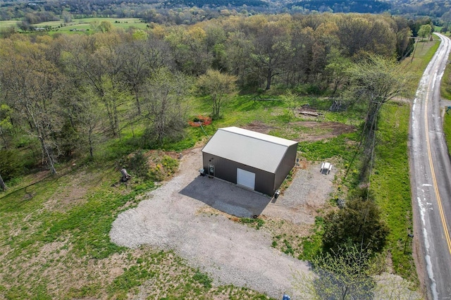29455 State Highway Ac, Lebanon, MO 65536 - aerial view of property and surrounding area with a heavily wooded area