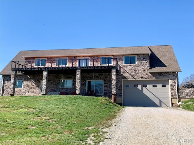 24613 Shady Oak Pl, Perry, MO 63462 - view of front of property with dirt driveway, a front yard, a wooden deck, a garage, and stone siding