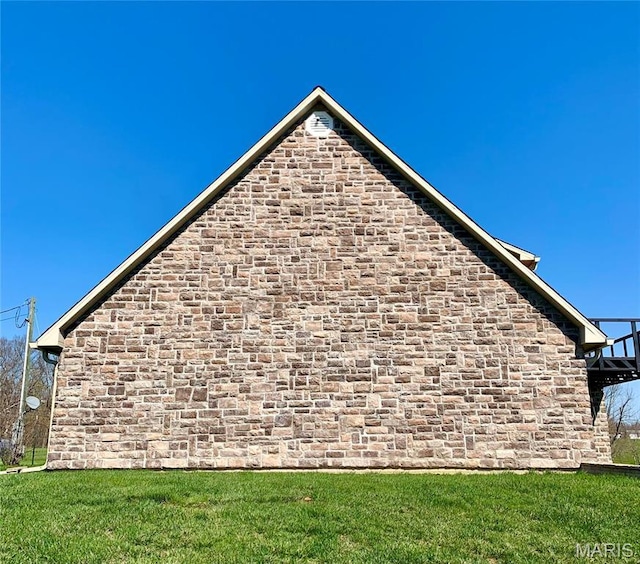 24613 Shady Oak Pl, Perry, MO 63462 - view of side of home featuring a lawn and stone siding