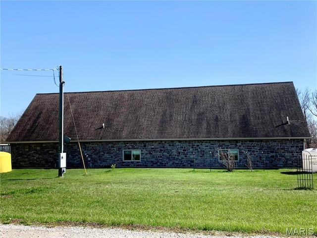 24613 Shady Oak Pl, Perry, MO 63462 - rear view of property featuring a lawn and a shingled roof