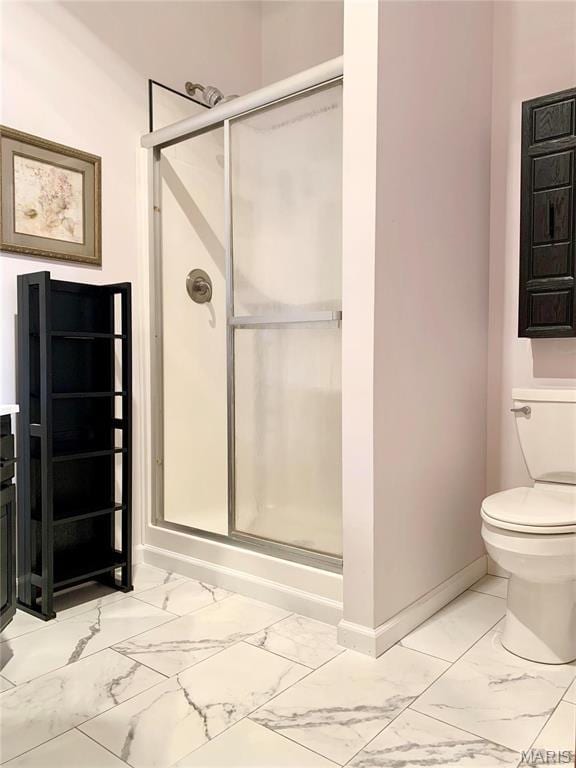 24613 Shady Oak Pl, Perry, MO 63462 - full bath with marble look tiles, a stall shower, toilet, and baseboards