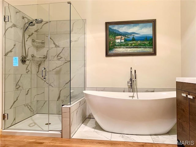 24613 Shady Oak Pl, Perry, MO 63462 - full bathroom featuring a shower stall, a soaking tub, and vanity