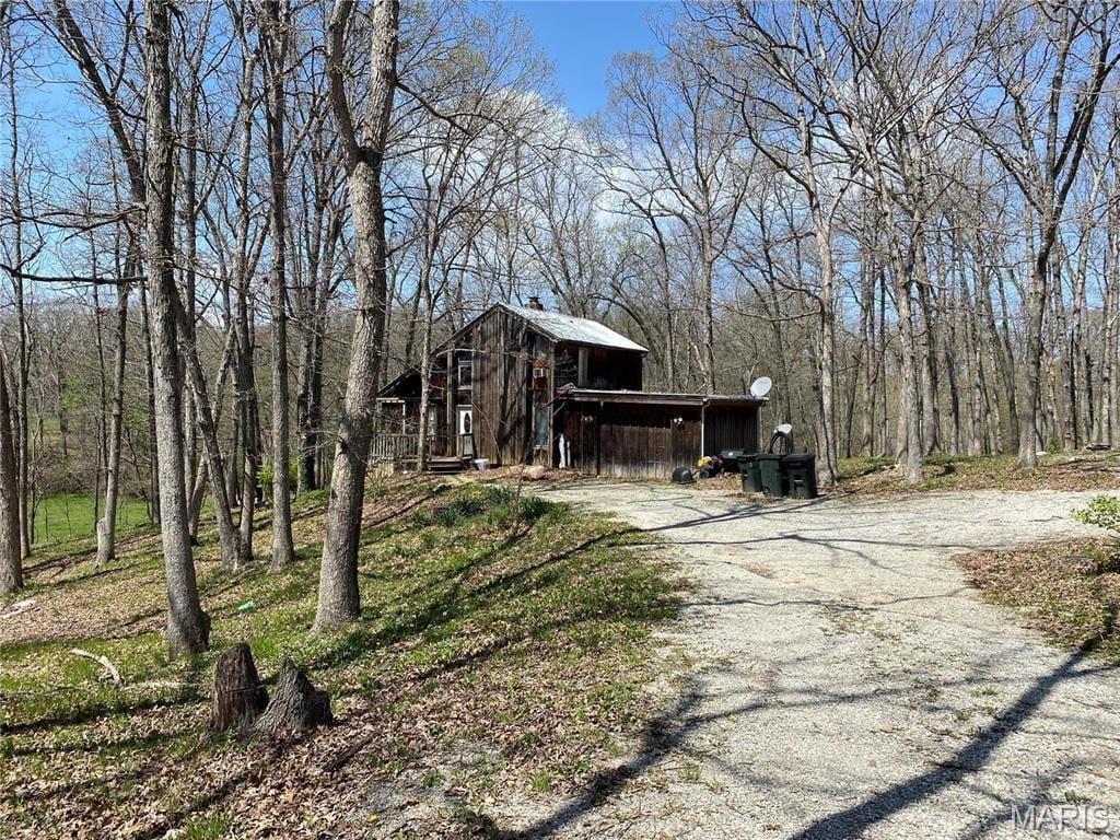1361 County Road 2347, Moberly, MO 65270 - view of front of home with a forest view