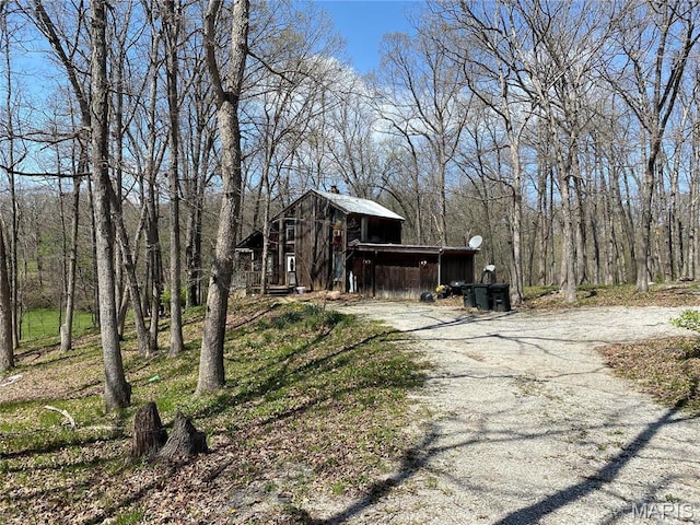 1361 County Road 2347, Moberly, MO 65270 - view of front of home with a forest view