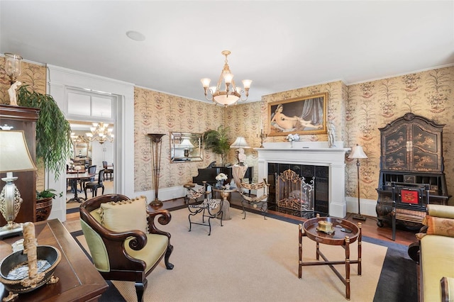 813 S 4th St, Clarksville, MO 63336 - living room featuring a chandelier, wallpapered walls, a fireplace, and ornamental molding