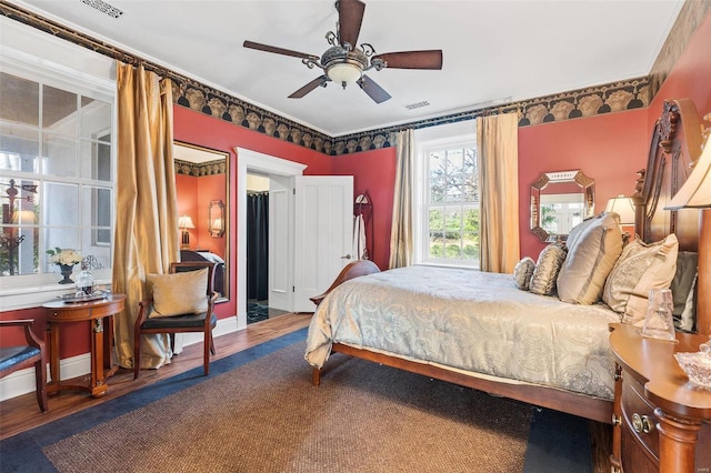 813 S 4th St, Clarksville, MO 63336 - bedroom with wood finished floors and ceiling fan