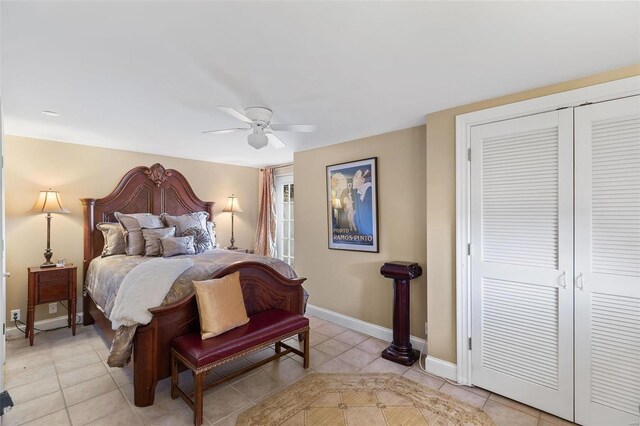 813 S 4th St, Clarksville, MO 63336 - bedroom with light tile patterned floors, baseboards, a ceiling fan, and a closet