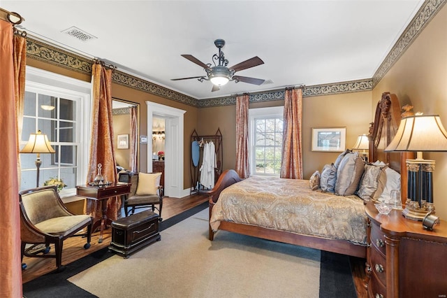 813 S 4th St, Clarksville, MO 63336 - bedroom featuring crown molding, a ceiling fan, and baseboards