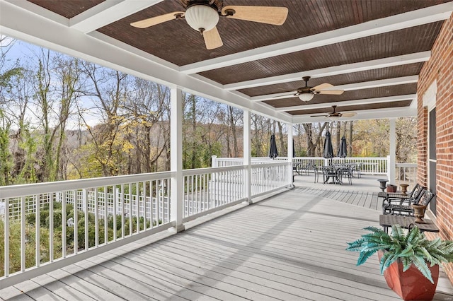 813 S 4th St, Clarksville, MO 63336 - wooden terrace featuring ceiling fan and outdoor dining area